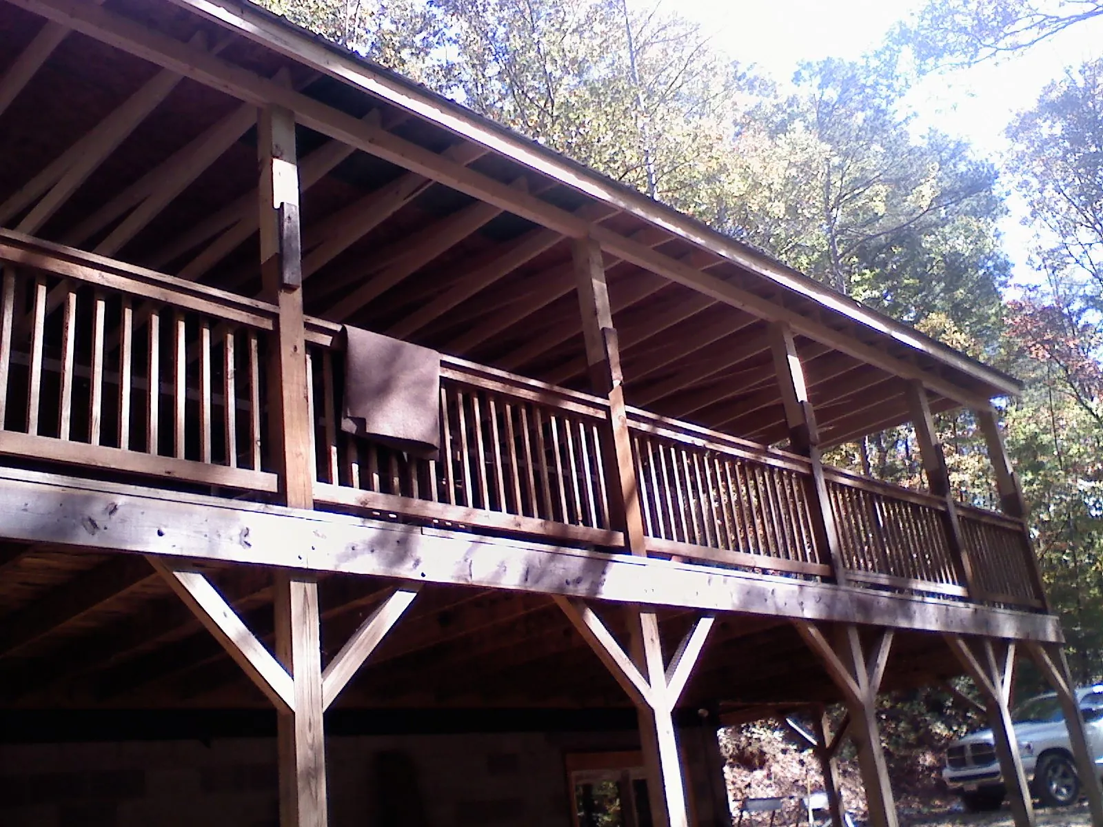 Timber framing under a new elevated porch and deck — Roof Leak Repair in Swanton by Roofing Brothers